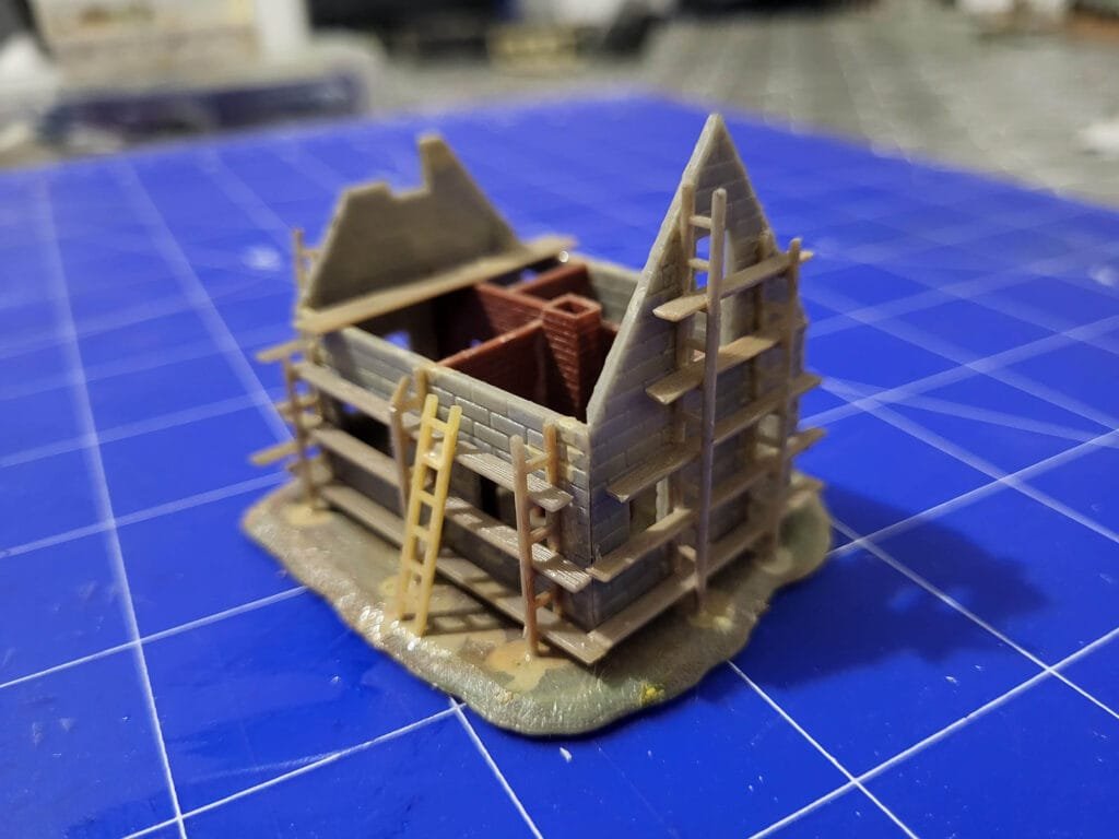 Miniature d'une maison en construction