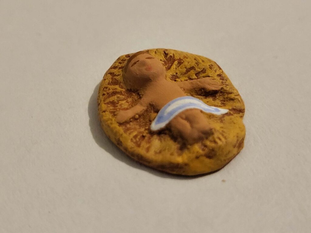 santons fouque 2cms jesus sur paille bras ouverts 001